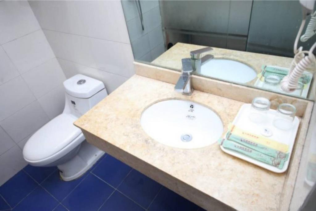 Yixin Business Hotel Guangzhou Exteriör bild